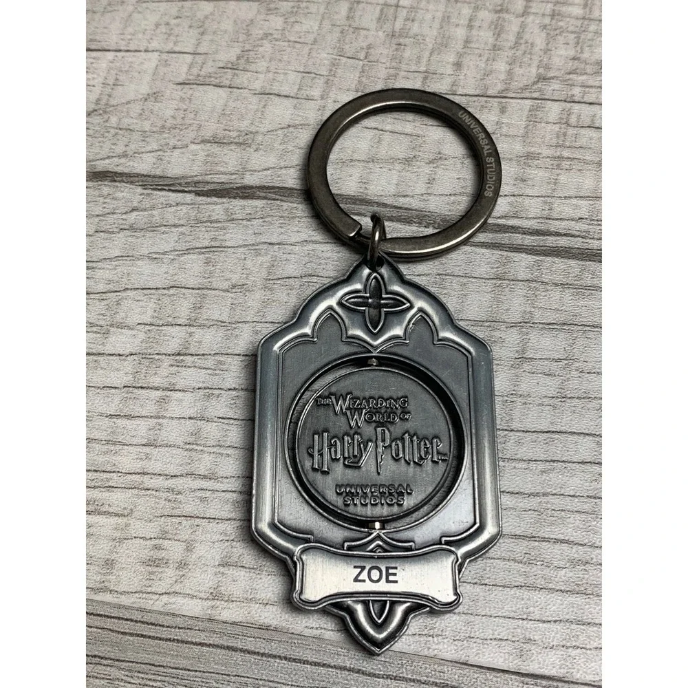 Universal Studios Harry Potter Spinning Hogwarts Keychain Zoe Nameplate Pewter